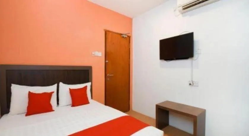 Bed in OYO 1111 Harmony Stay