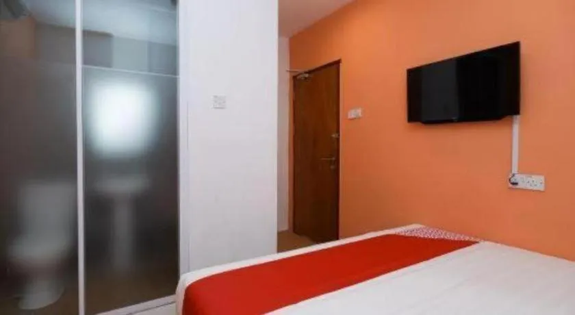 Bed in OYO 1111 Harmony Stay