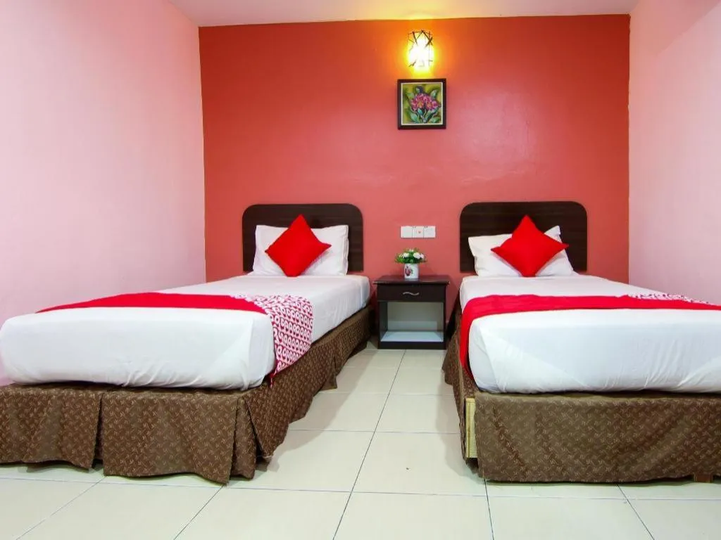 Bed in OYO 11343 Hotel Putra Iskandar