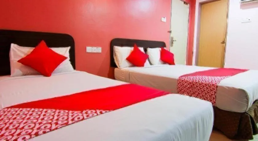 Bed in OYO 11343 Hotel Putra Iskandar