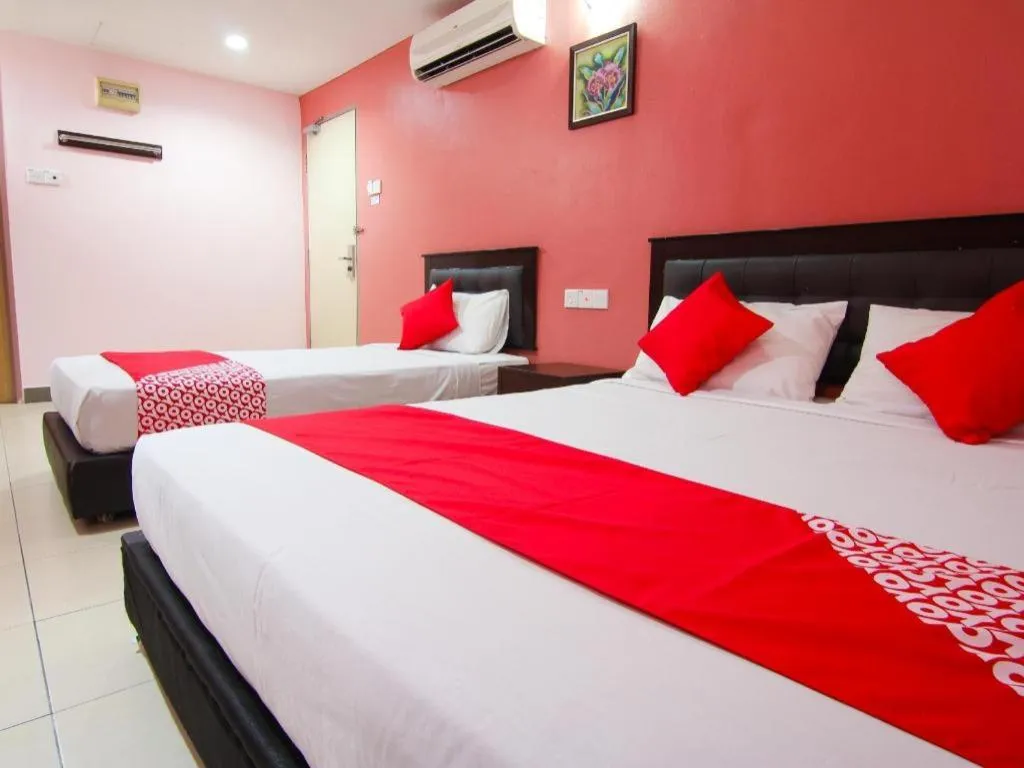 Bed in OYO 11343 Hotel Putra Iskandar