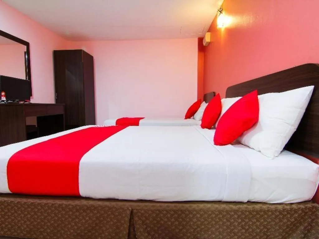 Bed in OYO 11343 Hotel Putra Iskandar