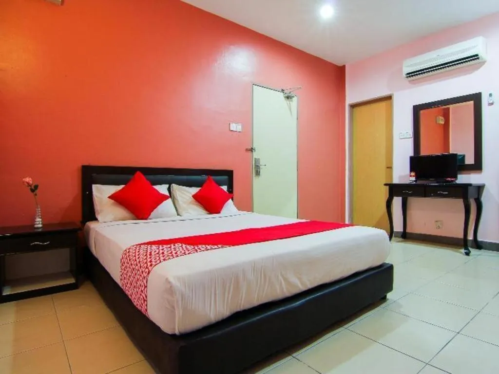 Bed in OYO 11343 Hotel Putra Iskandar
