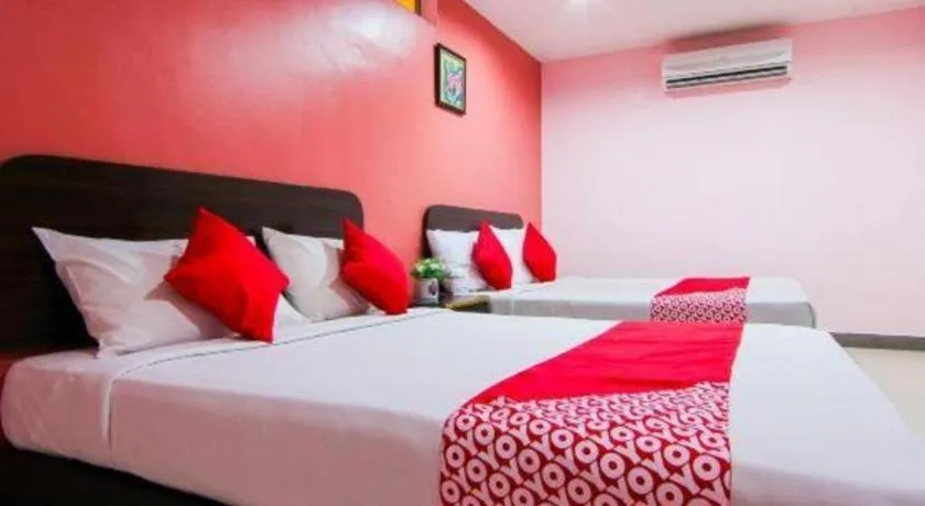 Bed in OYO 11343 Hotel Putra Iskandar