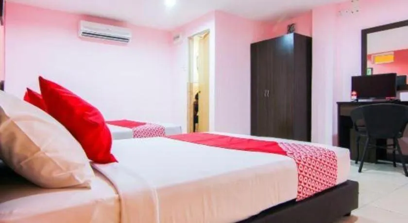 Bed in OYO 11343 Hotel Putra Iskandar