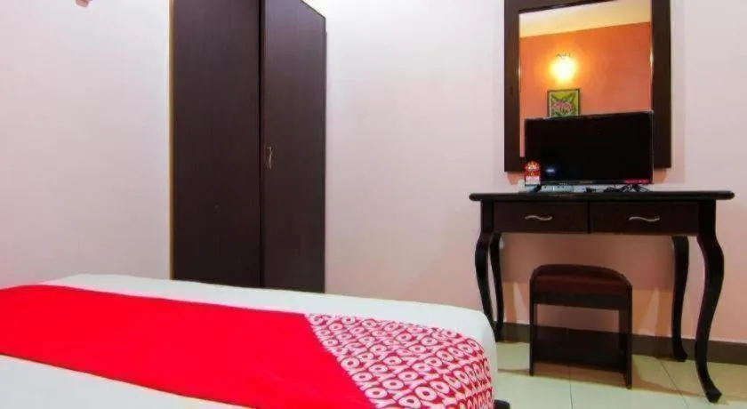 Bed in OYO 11343 Hotel Putra Iskandar