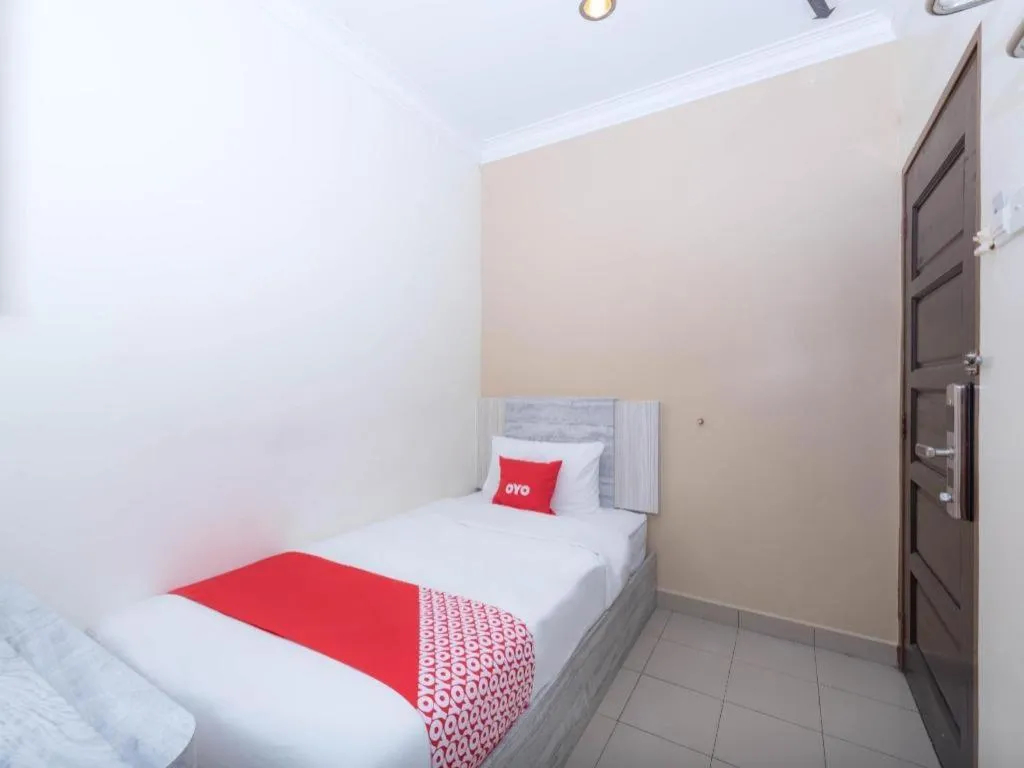 Bed in Capital O 89366 Spring Inn Hotel