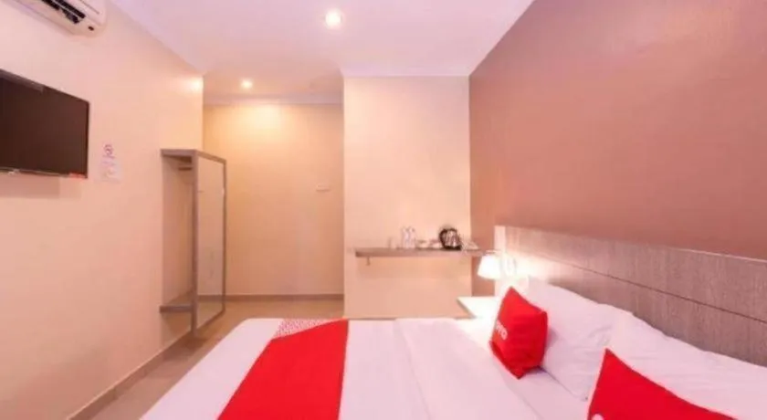 Bed in Capital O 89366 Spring Inn Hotel