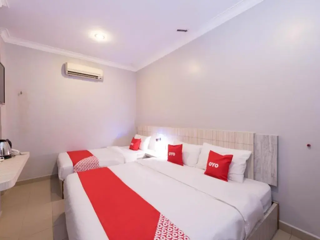 Bed in Capital O 89366 Spring Inn Hotel Bed in Capital O 89366 Spring Inn Hotel