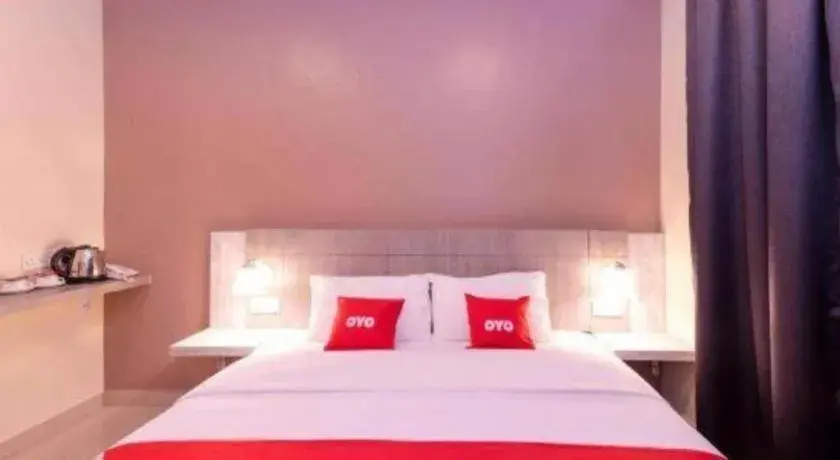 Bed in Capital O 89366 Spring Inn Hotel Bed in Capital O 89366 Spring Inn Hotel