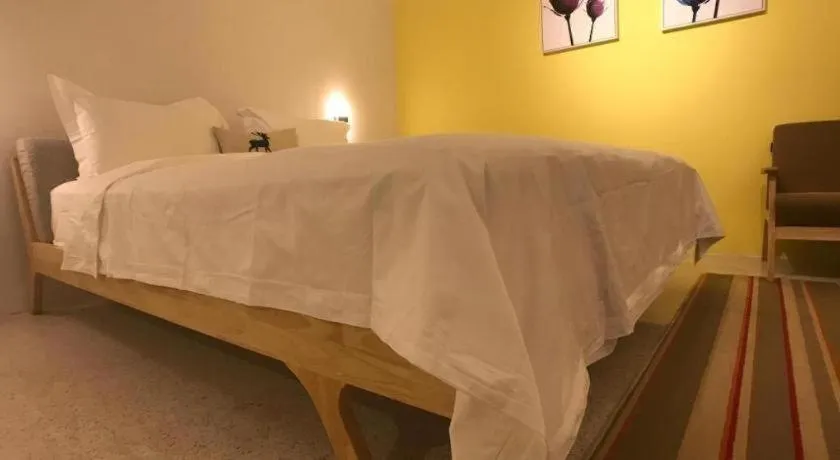 Bed in Kinta Valley Retreat