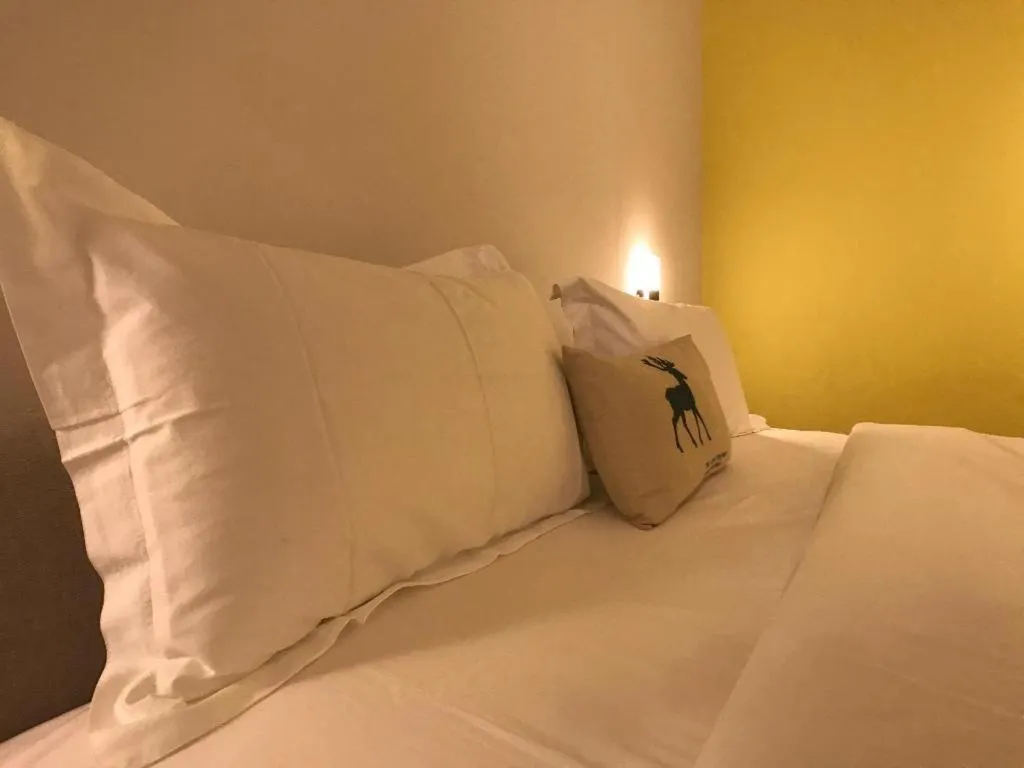 Bed in Kinta Valley Retreat