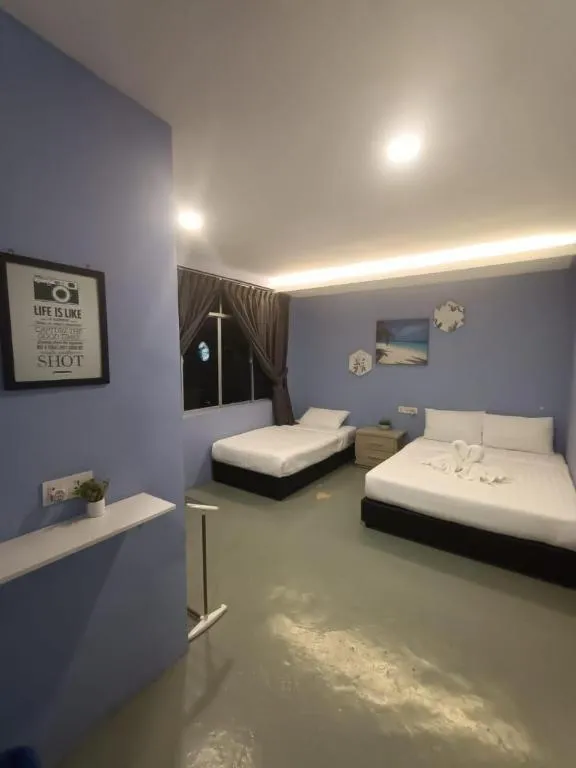 Bed in Semporna Dream Villa