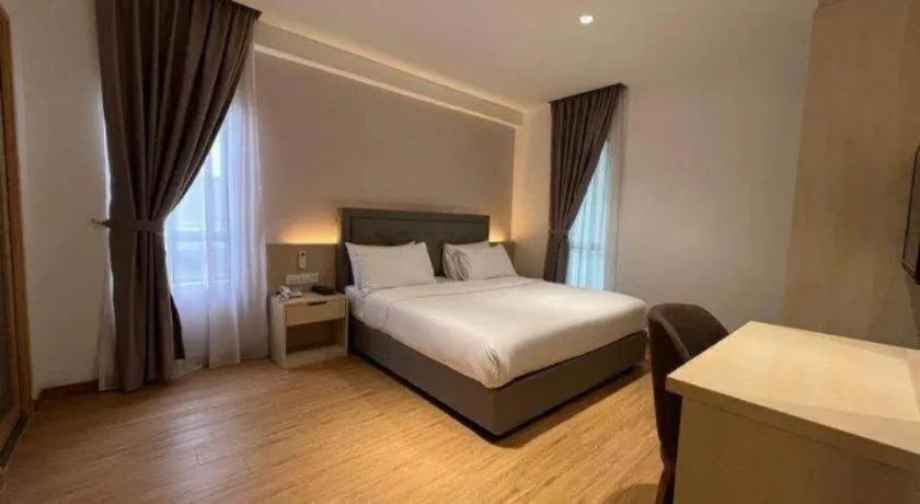 Bed in MIYABI HOTEL PERMAS