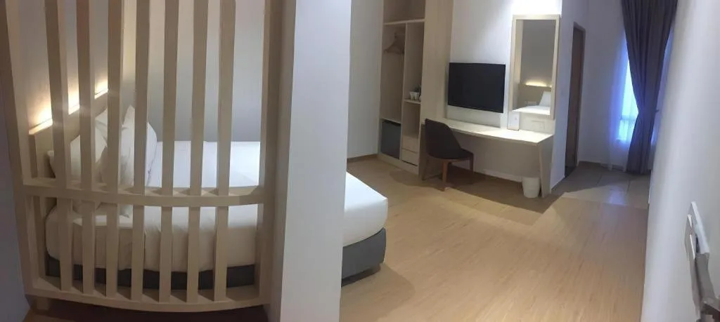 Bed in MIYABI HOTEL PERMAS