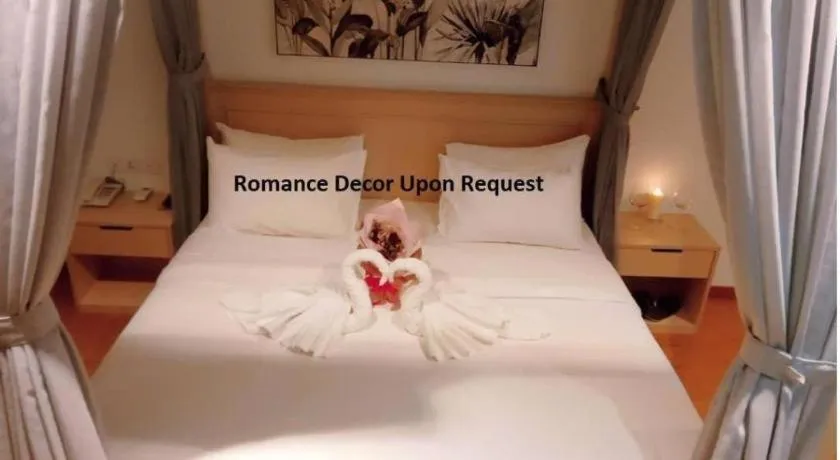 Bed in MIYABI HOTEL PERMAS