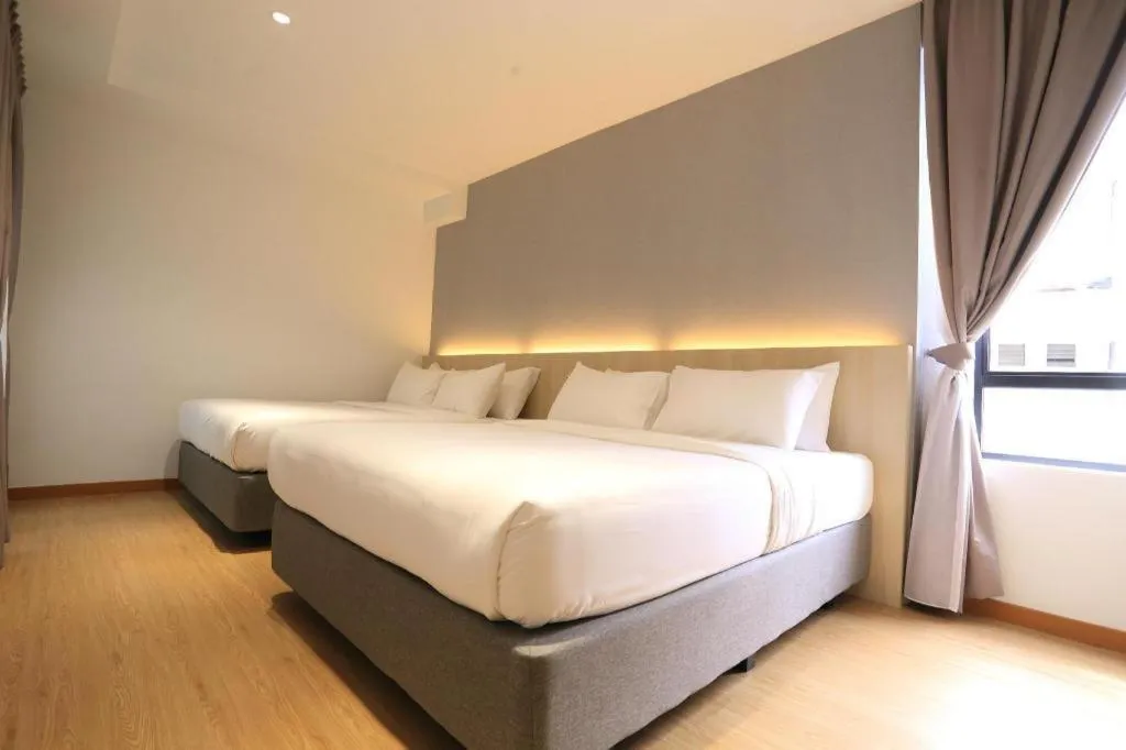 Bed in MIYABI HOTEL PERMAS