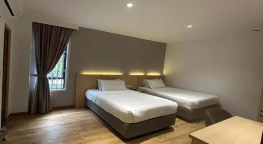 Bed in MIYABI HOTEL PERMAS