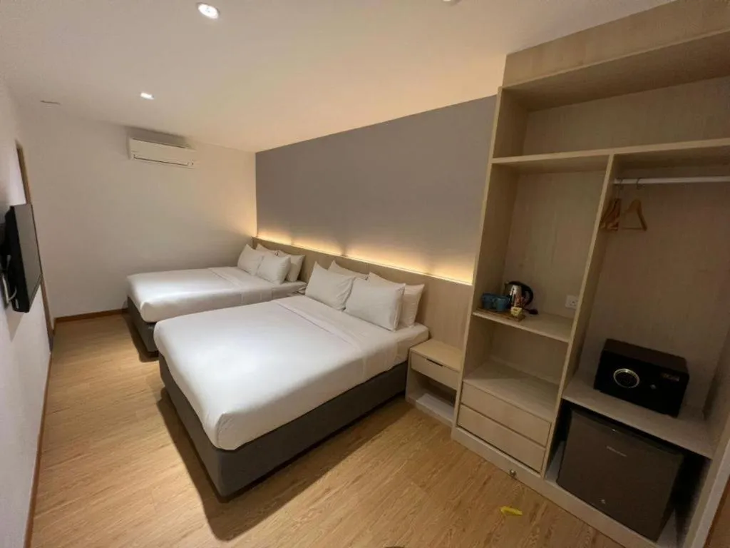 Bed in MIYABI HOTEL PERMAS