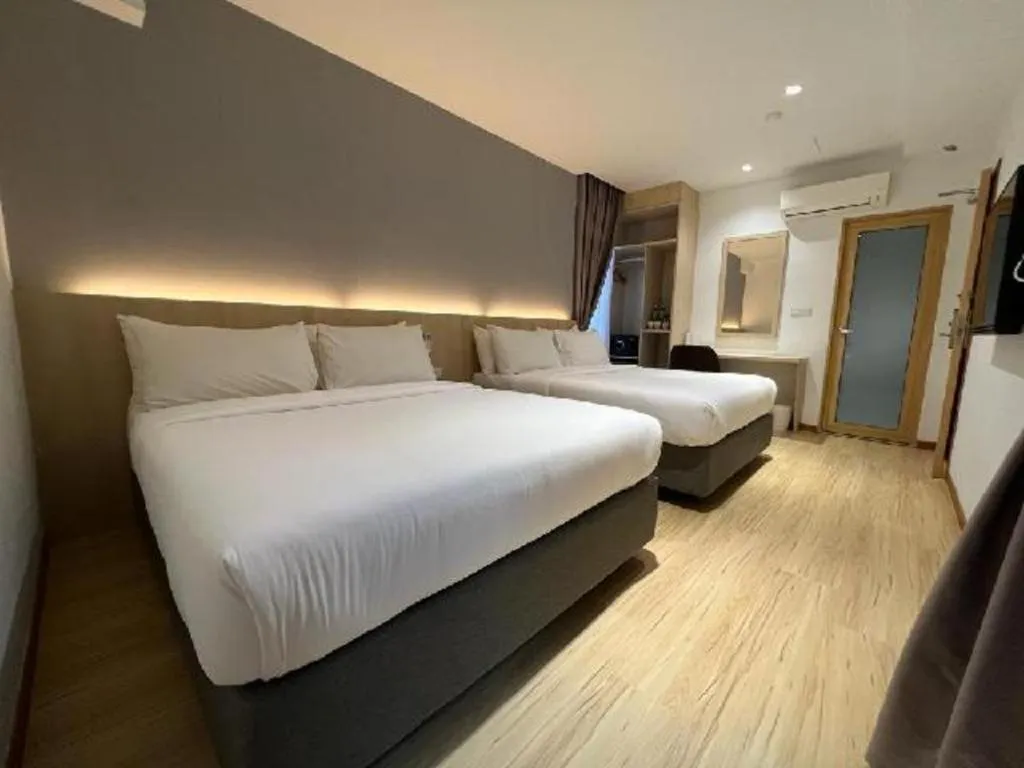 Bed in MIYABI HOTEL PERMAS