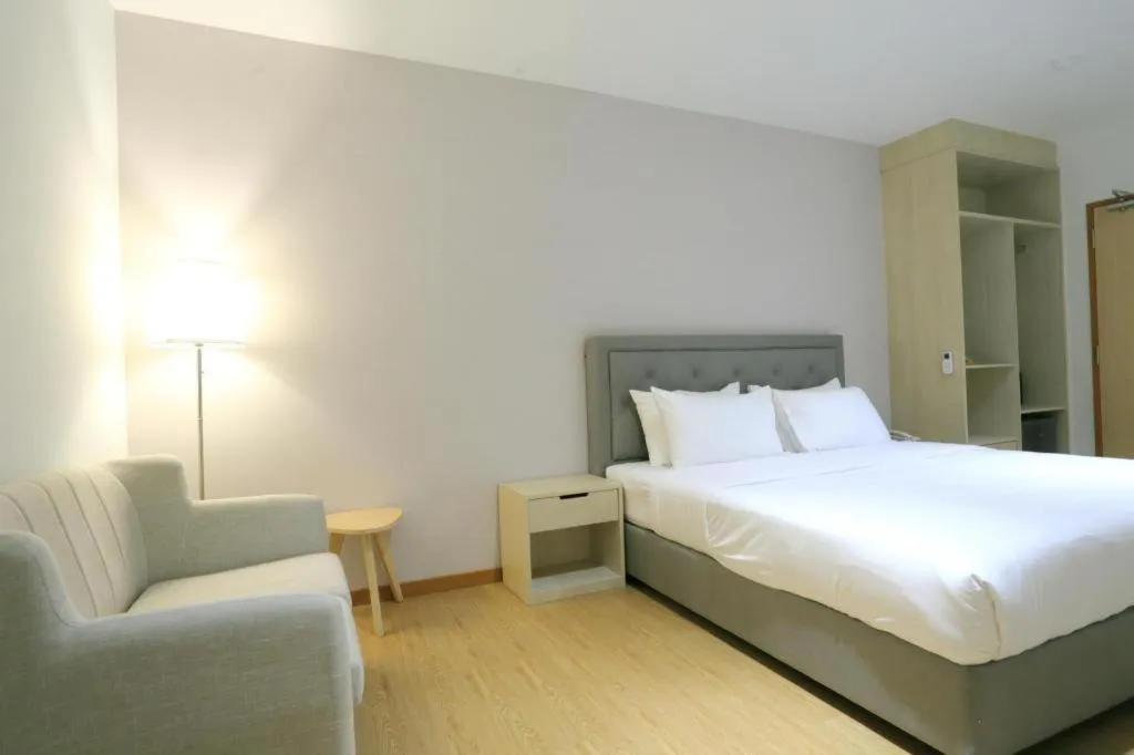 Bed in MIYABI HOTEL PERMAS