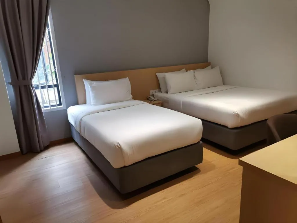 Bed in MIYABI HOTEL PERMAS