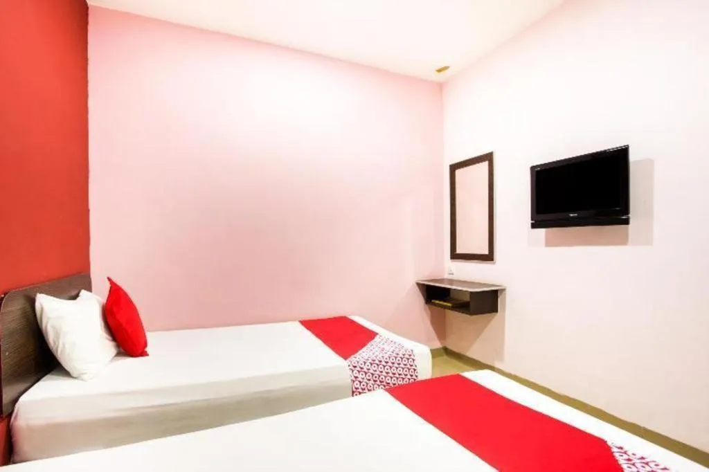 Bed in OYO 89539 Hotel Siswa