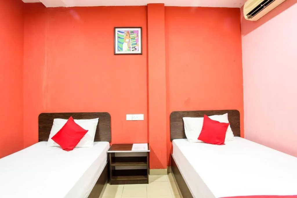Bed in OYO 89539 Hotel Siswa