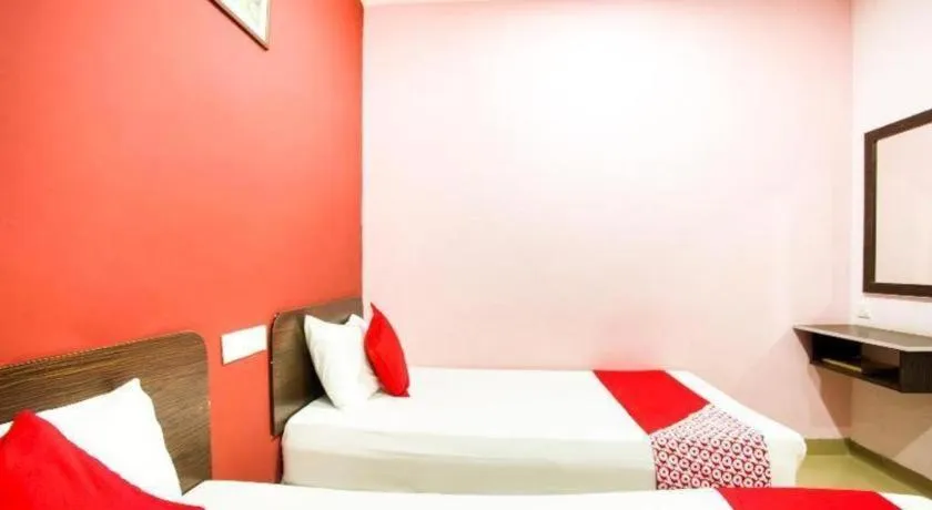 Bed in OYO 89539 Hotel Siswa