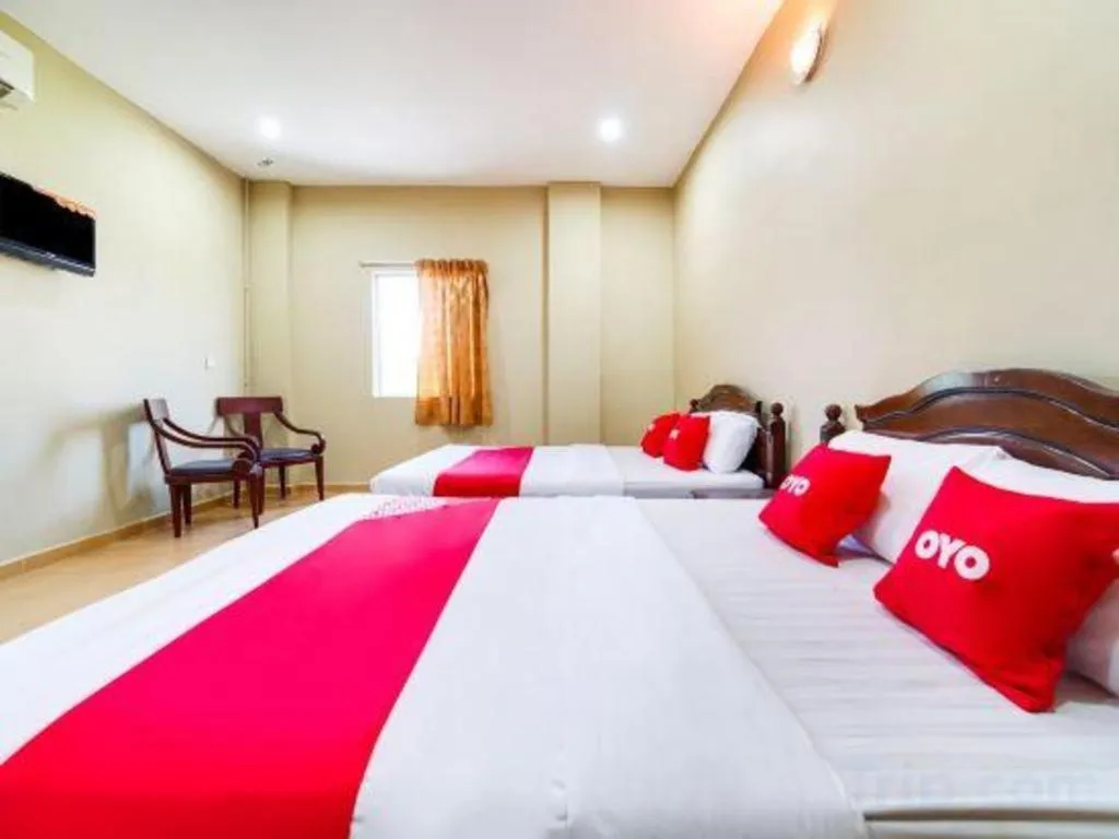 Bed in OYO 44058 MOTEL SRE BAYAM