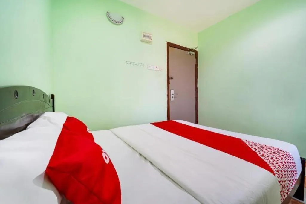 Bed in OYO 44058 MOTEL SRE BAYAM