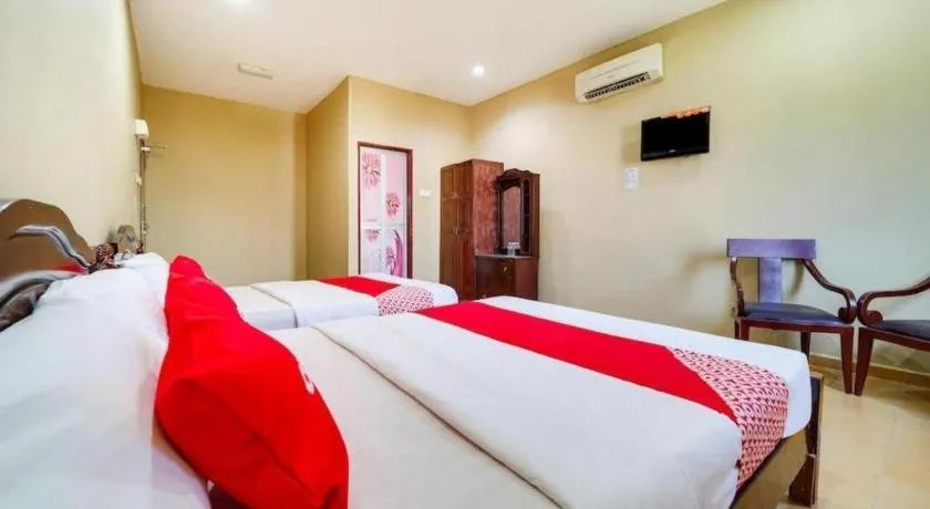 Bed in OYO 44058 MOTEL SRE BAYAM