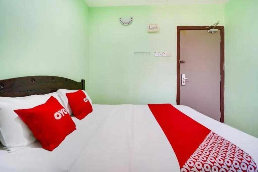 Bed in OYO 44058 MOTEL SRE BAYAM