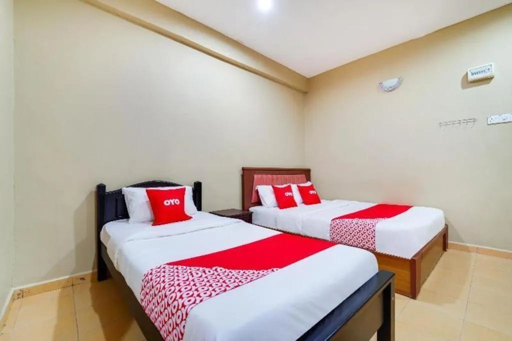 Bed in OYO 44058 MOTEL SRE BAYAM