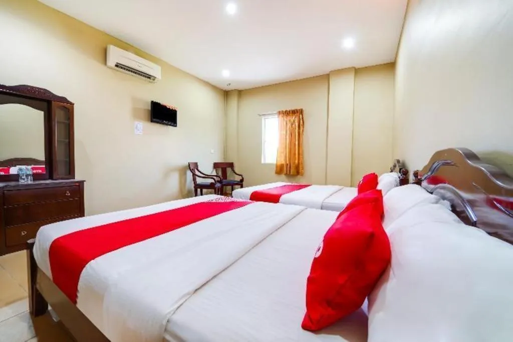 Bed in OYO 44058 MOTEL SRE BAYAM