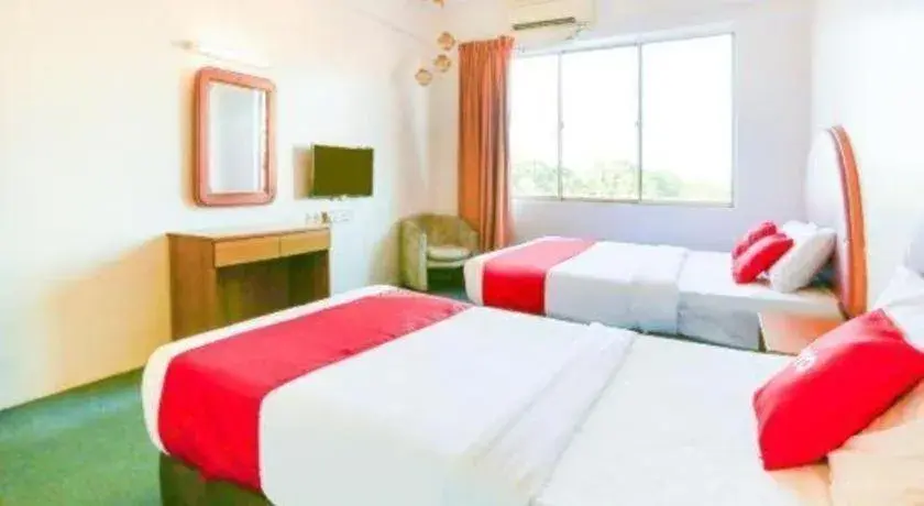 Bed in OYO 89638 Hotel Mandarin Inn Bed in OYO 89638 Hotel Mandarin Inn