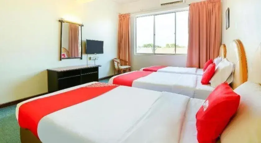 Bed in OYO 89638 Hotel Mandarin Inn Bed in OYO 89638 Hotel Mandarin Inn