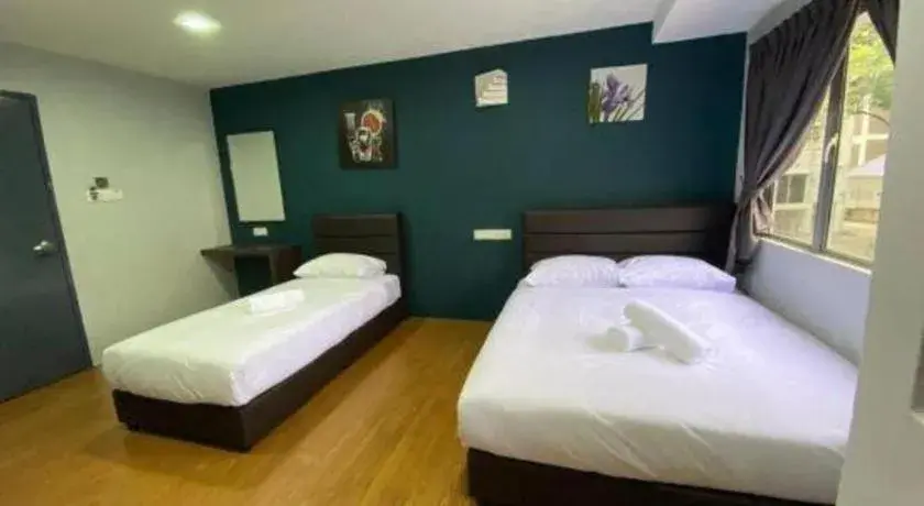 Bed in Capital O 89346 Sri Mutiara Hotel Bed in Capital O 89346 Sri Mutiara Hotel