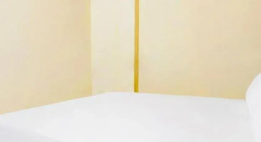 Bed in Capital O 89346 Sri Mutiara Hotel Bed in Capital O 89346 Sri Mutiara Hotel