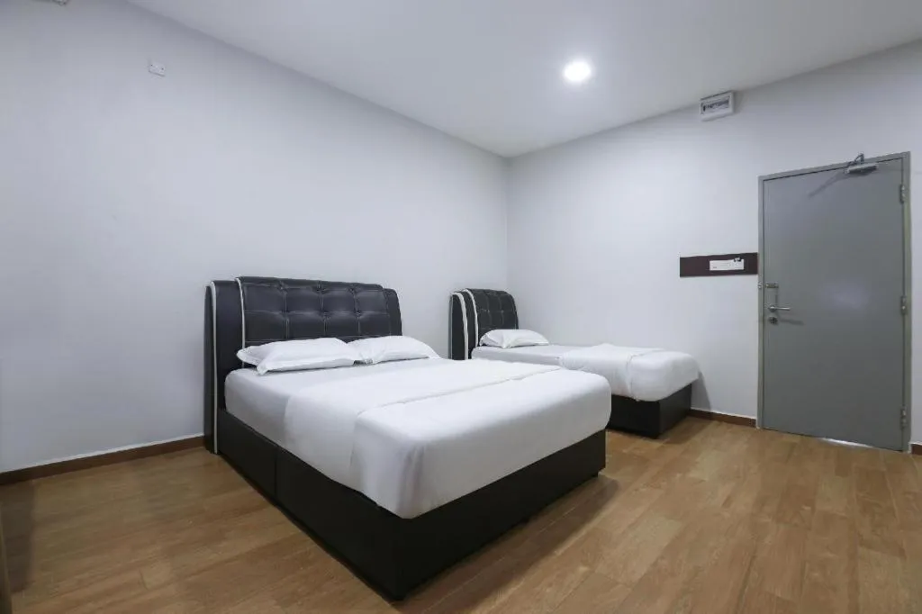 Bed in OYO 89859 PP Traveller's Hotel