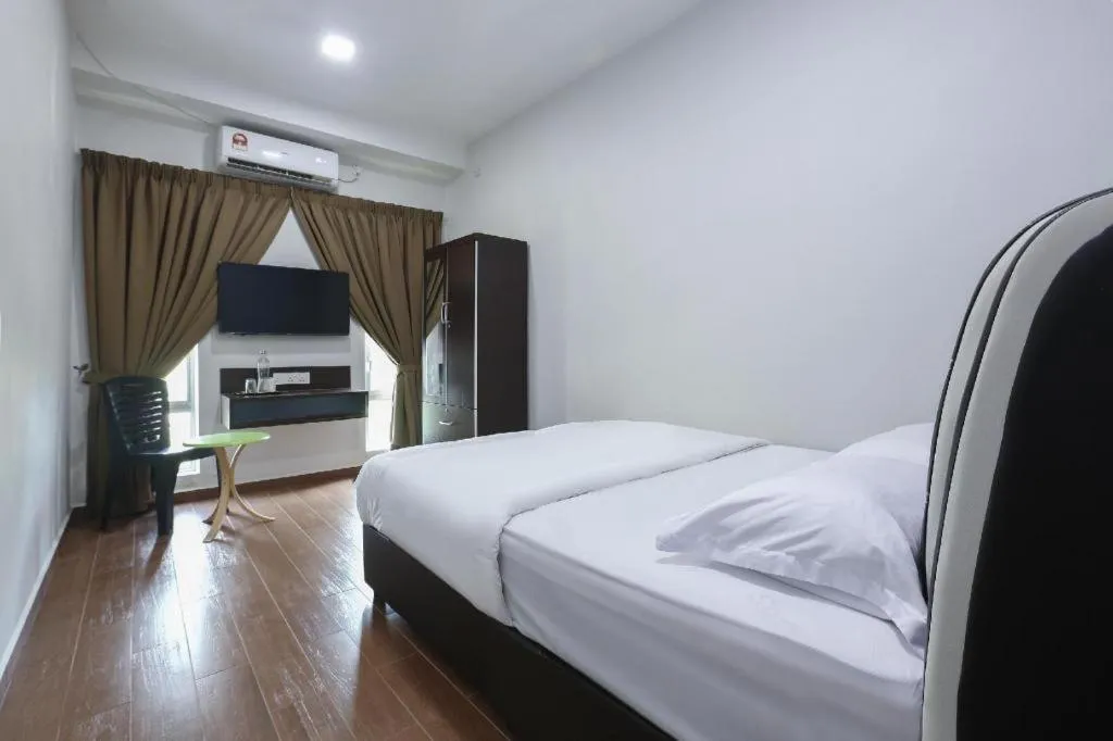 Bed in OYO 89859 PP Traveller's Hotel