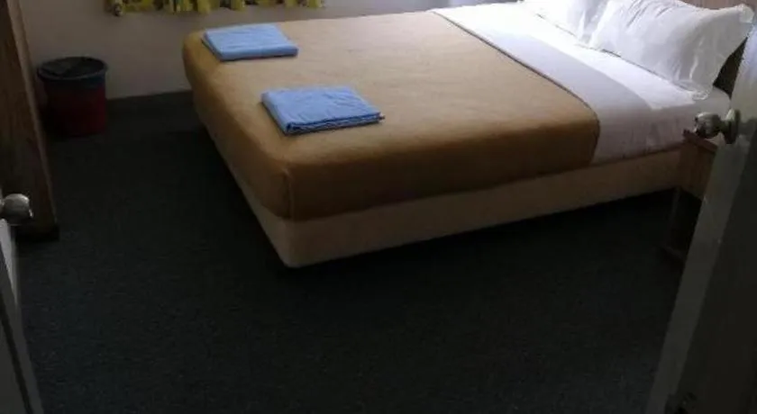 Bed in Capital O 89876 Safari Hotel