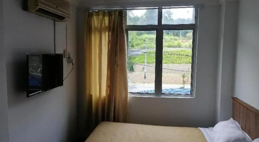 Bed in Capital O 89876 Safari Hotel