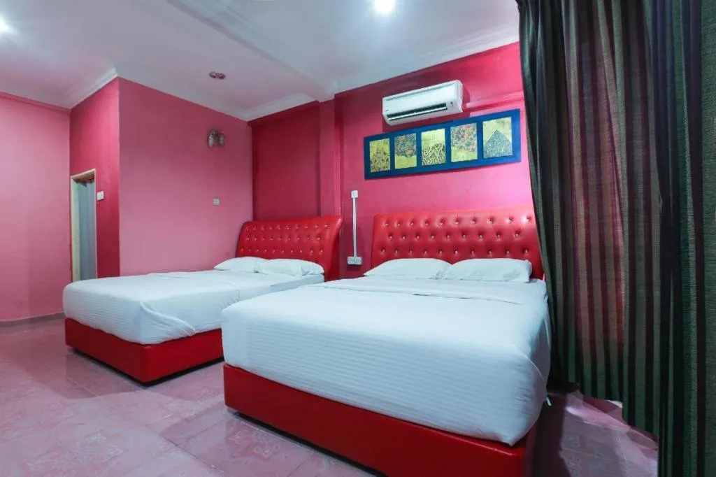 Bed in OYO 89892 Hotel Jeli Inn