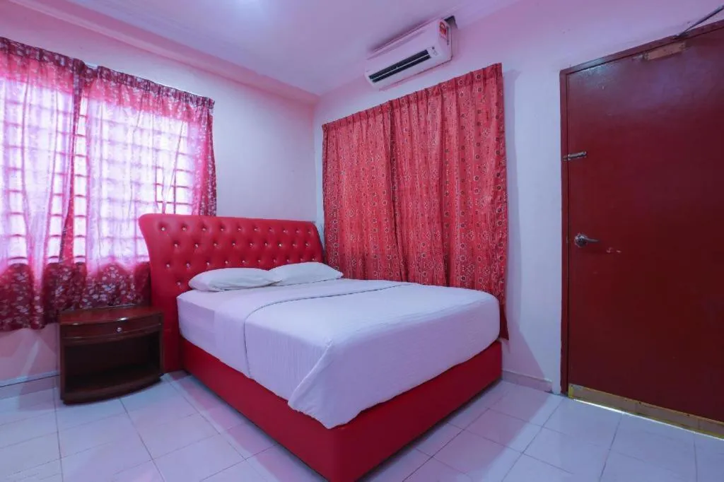 Bed in OYO 89892 Hotel Jeli Inn