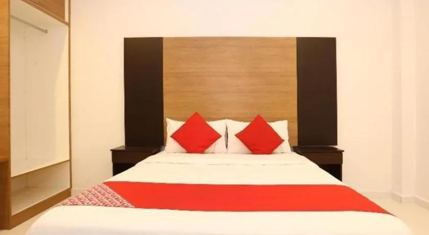 Bed in OYO 89888 DZ Residence Guest House