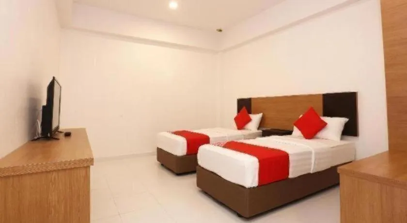 Bed in OYO 89888 DZ Residence Guest House