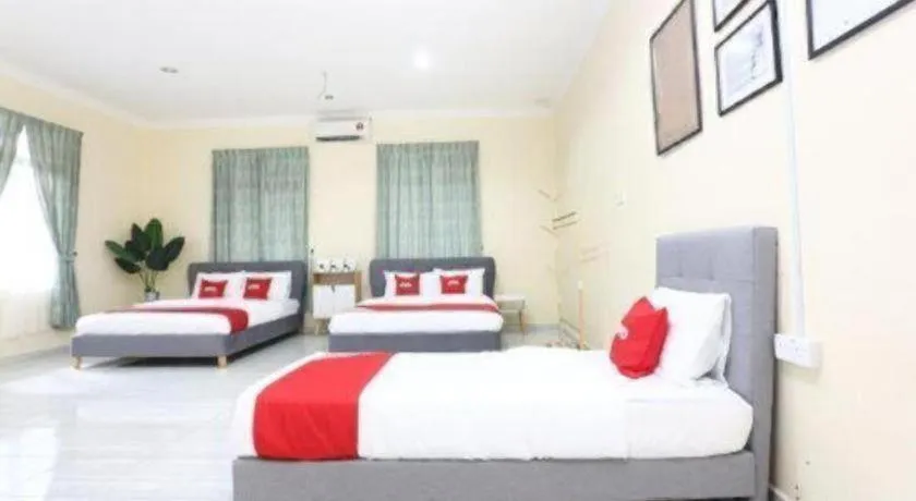 Bed in OYO 89607 Aloha Chalet