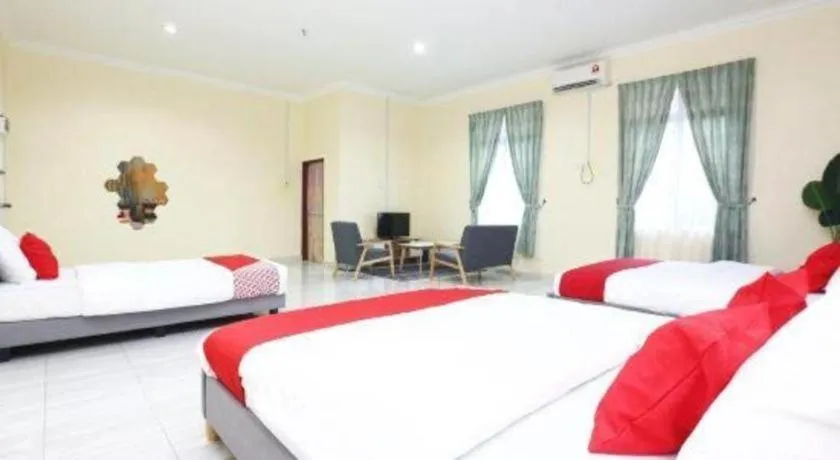 Bed in OYO 89607 Aloha Chalet