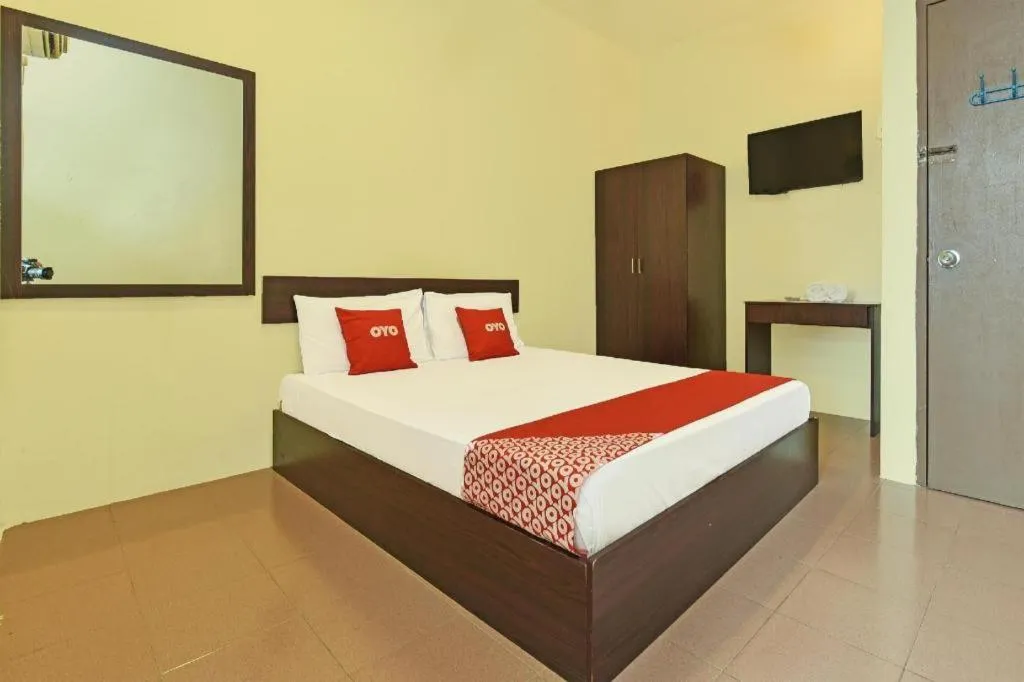 Bed in SPOT ON 91178 Motel Impian